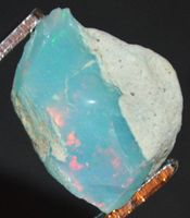 Edelstein L-7605 – Äthiopischer Paraiba Opal roh geräuchert