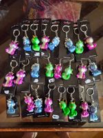 Lot 24 porte- clés dragons