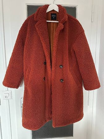 Manteau orange femme