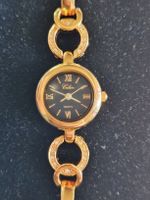 ​Belle montre pour femme Celsior – Dorée, strass,cadran noir