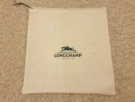 Longchamp sac à poussière 34x35cm comme neuf