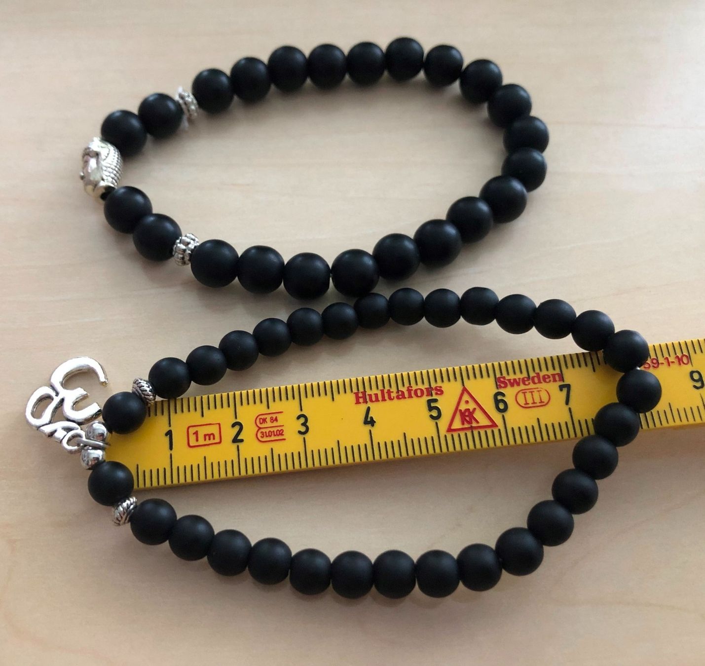Armbänder & -reifen: 2er-Set Armbänder Buddha + Om-Symbol matter, schwarzer Achat – Neu und originalverpackt aus Gossau/ZH von amazonas66 2