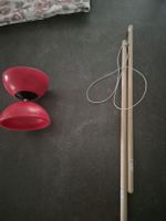 Diabolo red plastic with 2 wooden sticks used condition