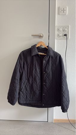 Veste matelassée noire JWA x Uniqlo