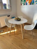 Maison du Monde white round table with three matching chairs
