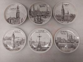 Set aus 6 dekorativen Porzellanuntertassen, Hamburg, Deutsch