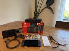 Nintendo Switch Grau (V1) mit Dock, Tasche, 2 Spiele