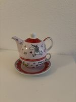 Teekanne mit Tasse und Untertasse