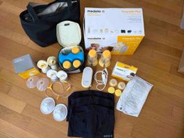 Medela Freestyle Flex Milchpumpe mit Zubehör