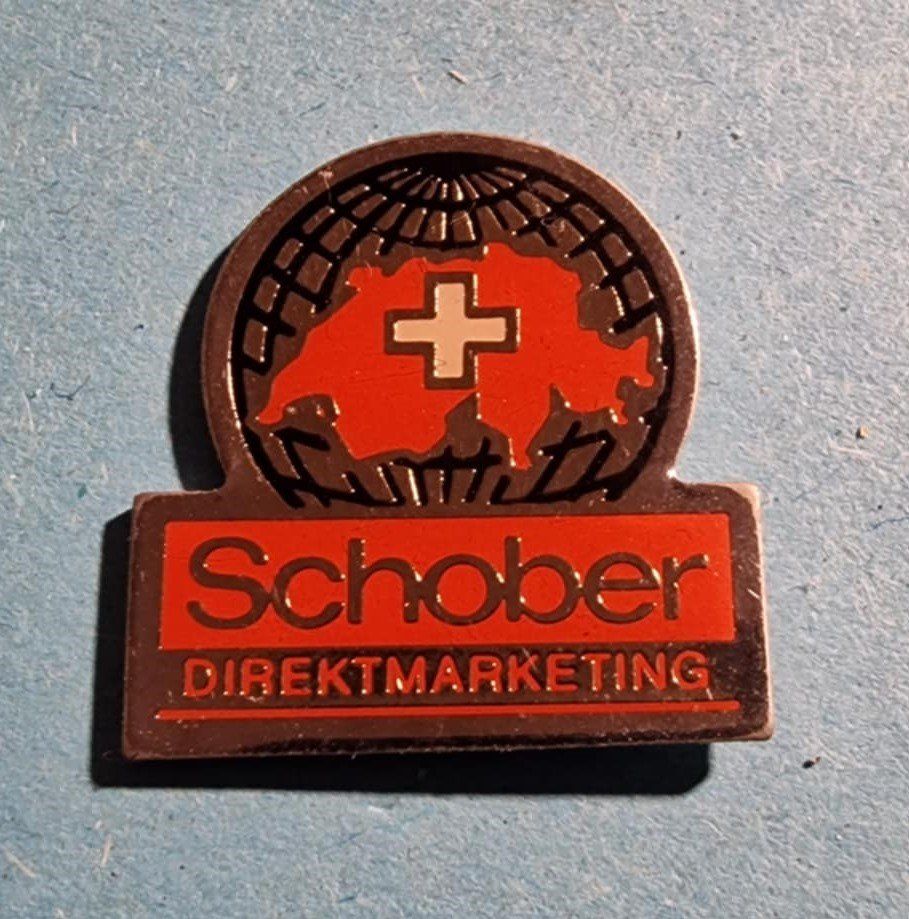 Plaquettes & Badges: Pin Schober Direktmarketing – D'occasion à Härkingen par specialshapes