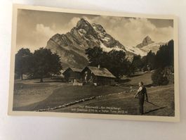 Ansichtskarte Braunwald am Heuerbergli Bauer mit Sägesse