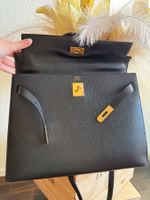 Hermès Kelly 35 / black Ardennes leather