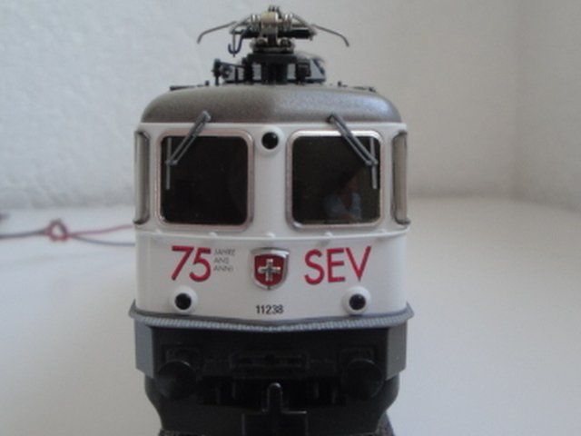 HAG 088 HO. locomotive CFF Re 4/4, 75 ans du SEV, avec boite (Neu und ...
