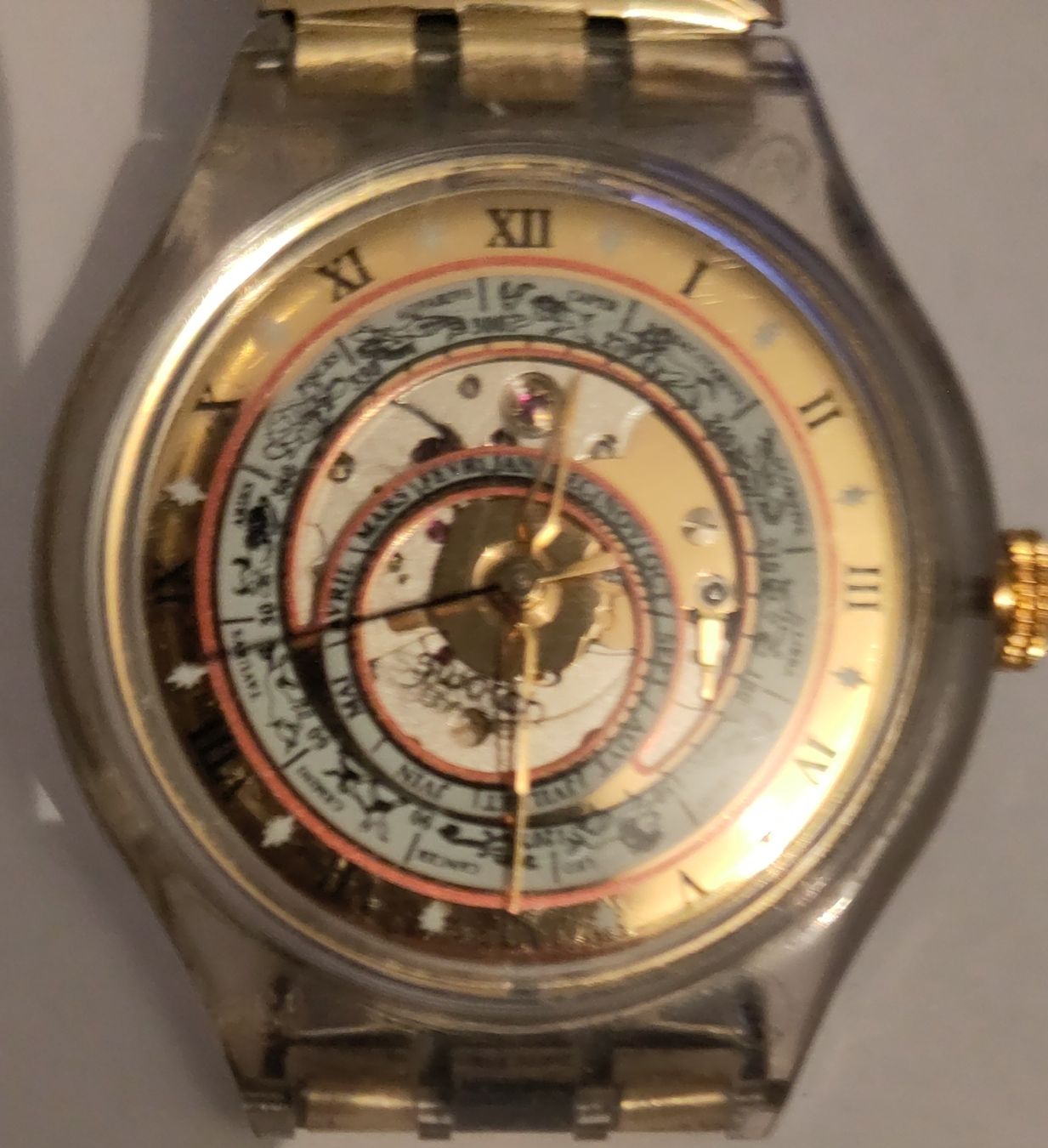 Swatch Orologi: Swatch Uhr mit Kalenderfunktion goldfarben transparent – Usato da Höri venduto da Samsa9
