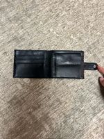 Portefeuille noir en cuir 