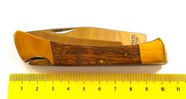 Couteau pliable neuf