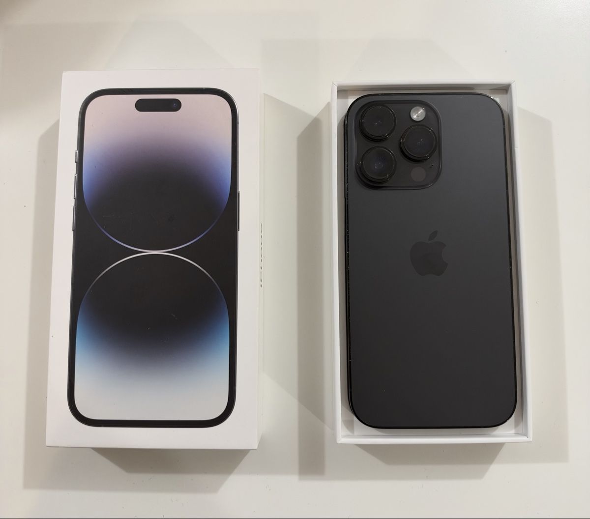 Apple Handys / Smartphones: Apple iPhone 14 Pro 128 Go noir  – Gebraucht aus Yverdon-les-Bains von AVRS.CH