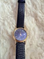 Montre vintage Tissot boîtier or 