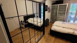 Armoire 2 grandes portes miroirs avec penderie