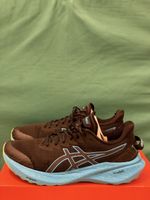 Asics Laufschuhe Grösse 42 schwarz blau mit Defekt