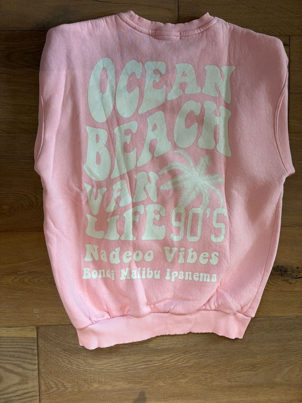 Pullover & Sweatshirts: Pull Nadeo rose imprimé dos taille M – Gebraucht aus Matran von BeMaLe 1