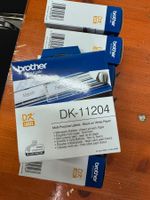 1.- Brother DK-11204 Etiketten Rolle 54 x 17 mm Papier Weiss