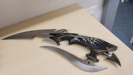 Messer mit Klingenspitze und integriertem Messer 