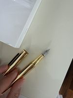 Gold colored fountain pen
