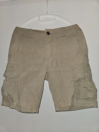 Short Dickies kaki, taille 31, était bien entretenue