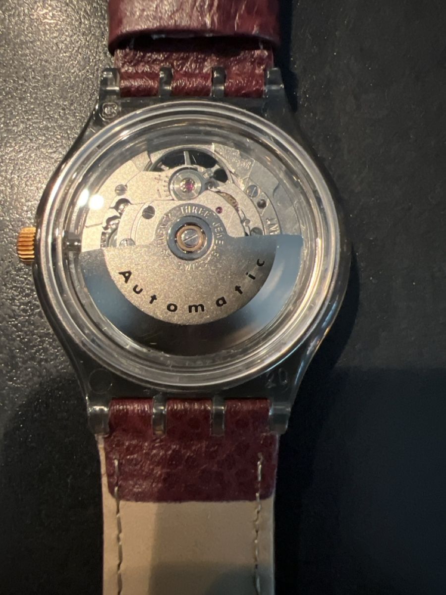 Swatch Orologi: Swatch Automatic (SAM100) Rubin - 1. Version – Nuovo e nell'imballaggio originale da Künten venduto da Spike17 2