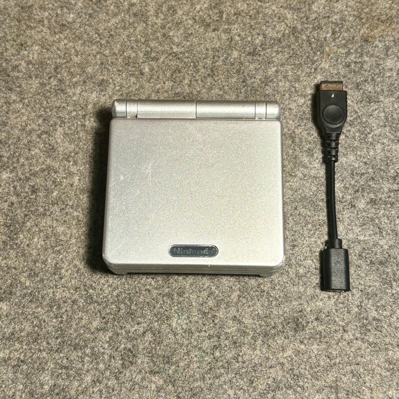 Nintendo Console: Gameboy Advance SP – Original Silber – Usato da Mollis venduto da GamingCorner 1