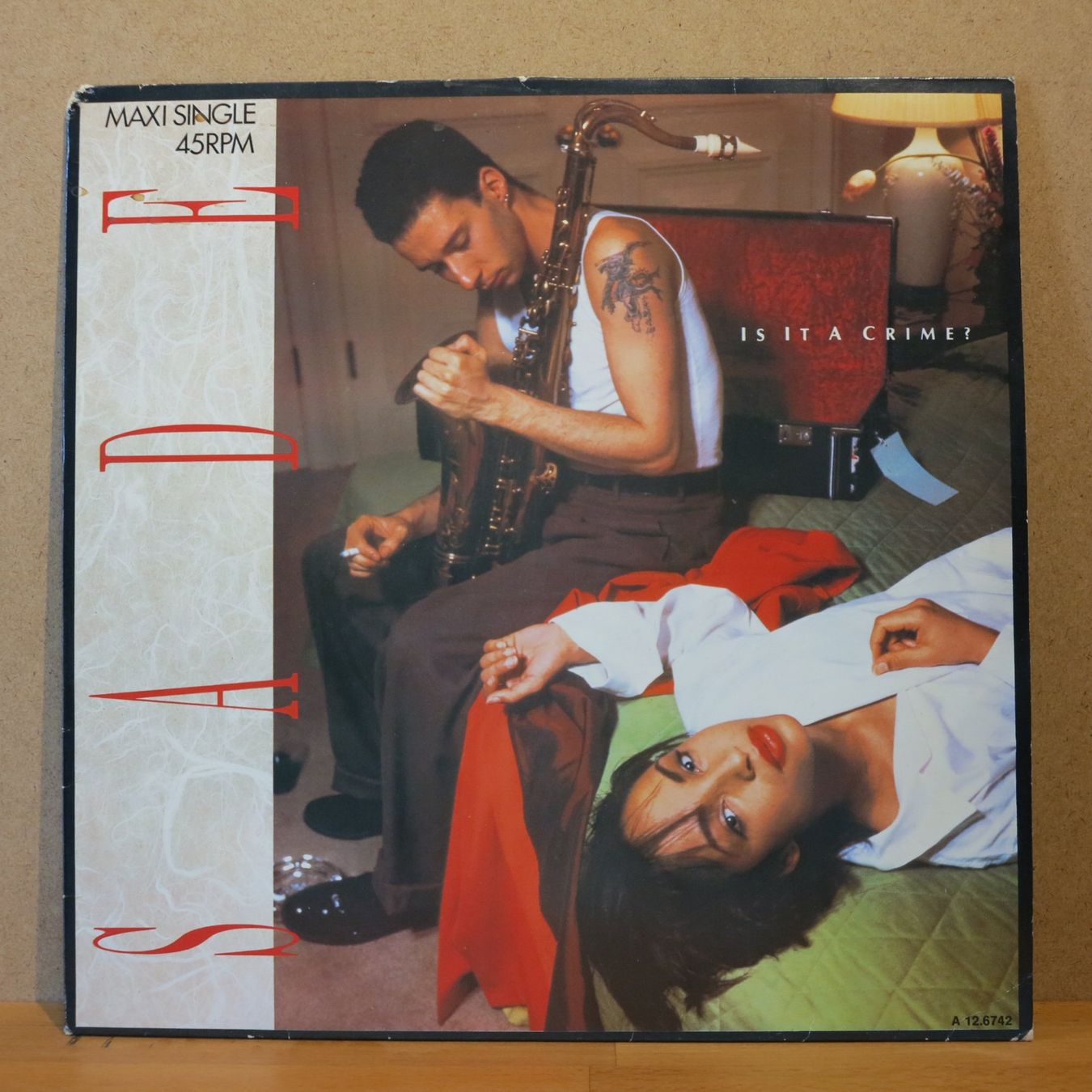 Dischi in vinile: Sade - IS IT A CRIME ? /  Maxi-Single /LP – Usato da Zürich venduto da Naim60