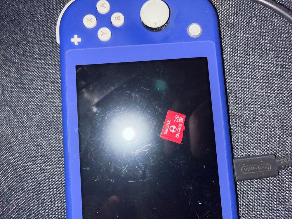 Nintendo Switch lite avec carte SD 128 GB