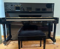 Piano droit modèle Yamaha de fabrication japonaise