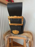 Treichel mit schwarzem Lederriemen