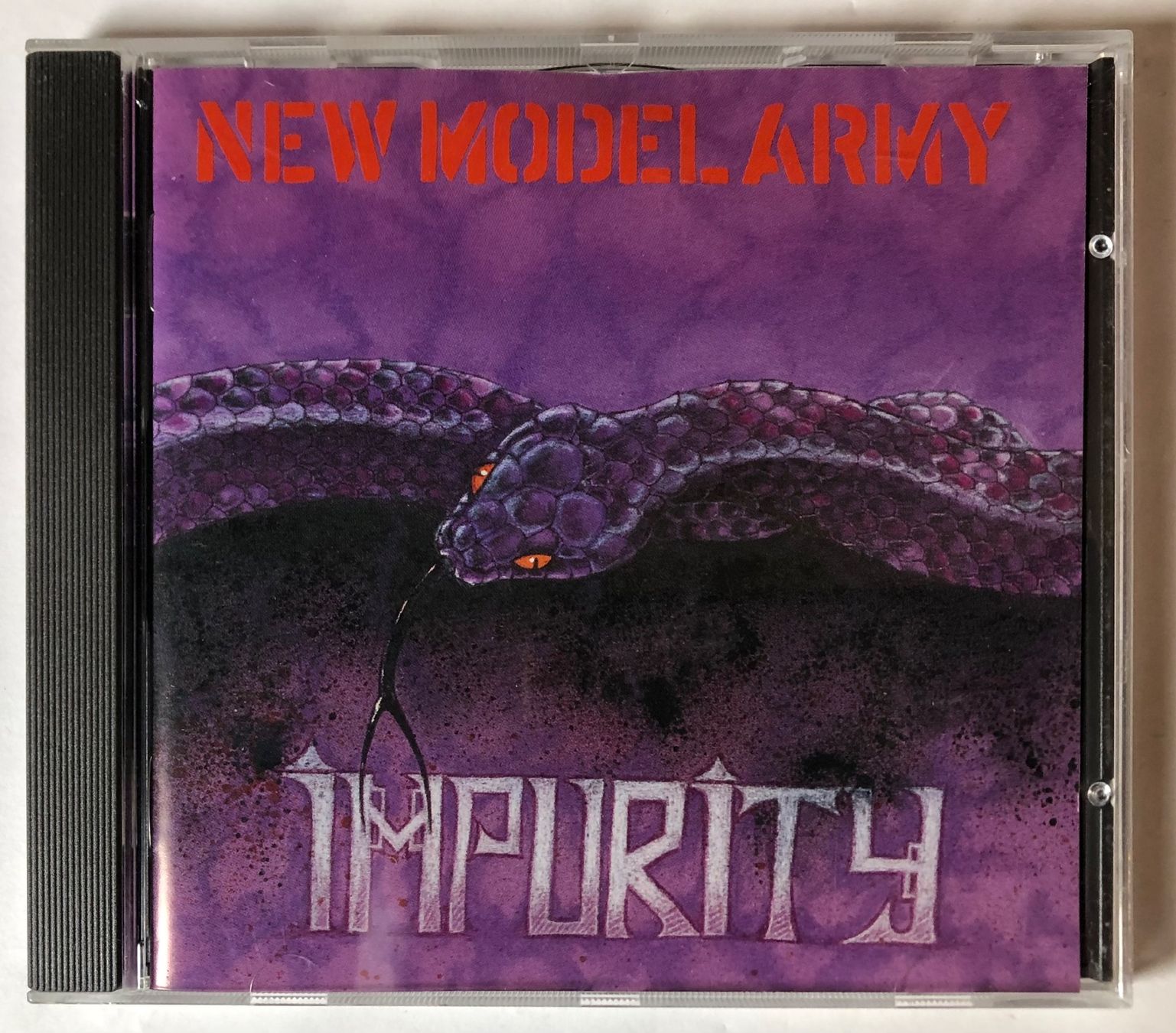 CD: NEW MODEL ARMY - IMPURITY – Usato da Poliez-Pittet venduto da Newtown-Records