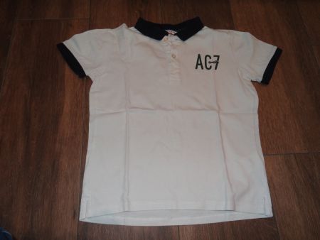 Polo Cyrillus blanc taille 10 ans coton enfant