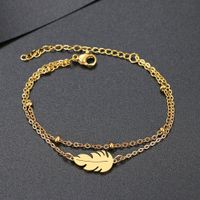 Edelstahl Armband mit "Feder" Anhänger in GOLD