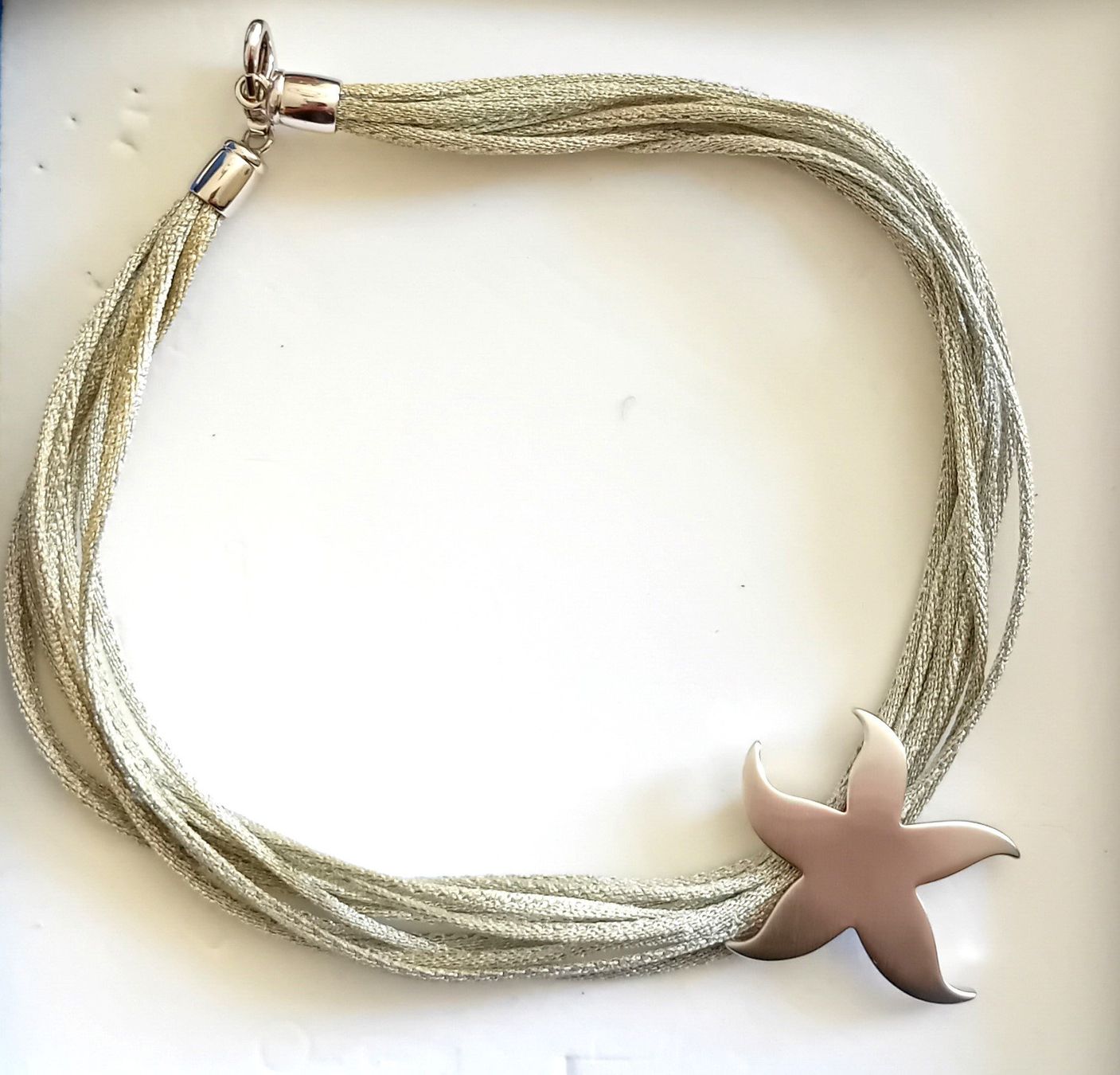 Pierre Lang Catenine: Collier / broche étoile argenté Pierre Lang - acier – Usato da Neuchatel venduto da Vlenoble 3