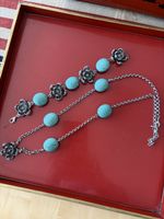 necklace and bracelet made of metal alloy and gemstone