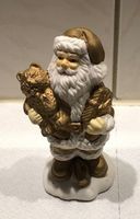 Hübsches Deko-Stück, Weihnachtsmann in goldenem Mantel