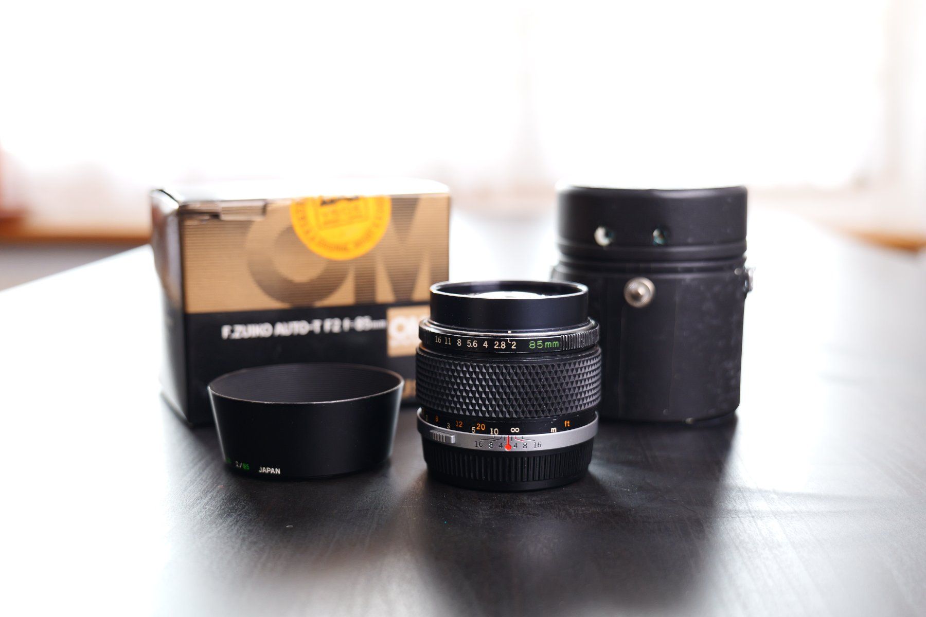 Olympus Objectifs: Olympus OM Zuiko 85mm f2 – D'occasion à Tecknau par LevinLaufmann 1