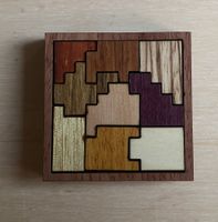 Mini-Puzzle aus schönen Hölzern