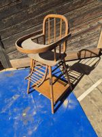 Ancienne chaise en bois pour bébé