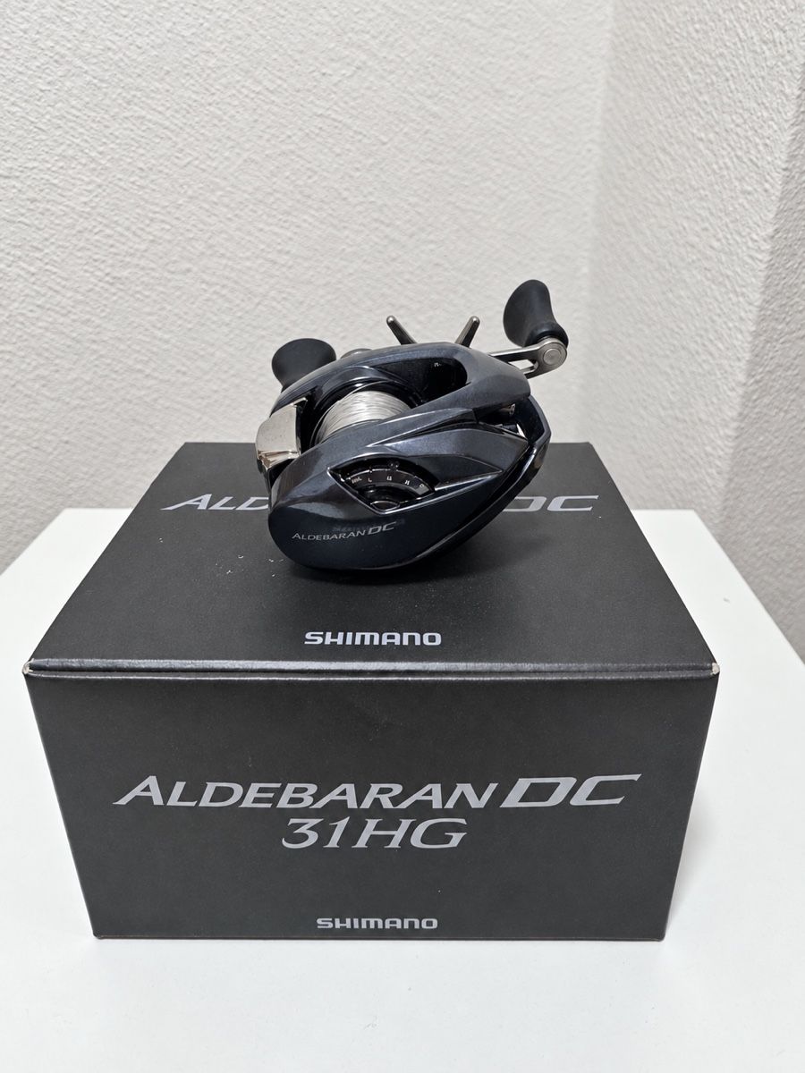 Shimano Tamburi & Mulinelli: Shimano Aldebaran DC 31HG – Nuovo (secondo la descrizione) da Menzingen venduto da fam_9x6m