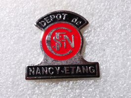 Ansteckpin 55: Depot of Nancy Etang