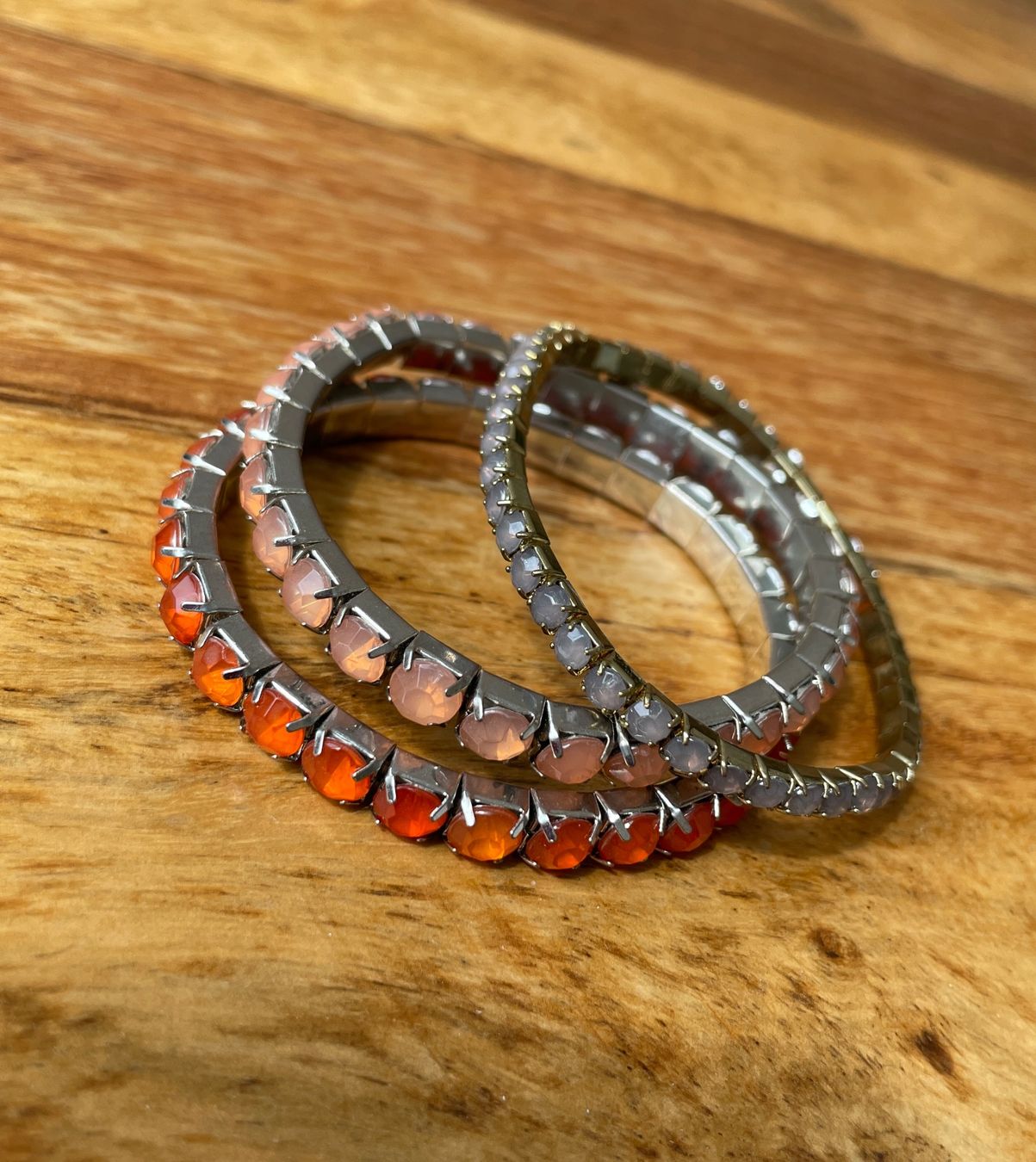 Bracciali & Braccialetti: 3 Stretcharmbänder – orange, lachs, olive – Usato da Grenchen venduto da M_ina