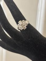 Magnifique bague marguerite en argent et zircons