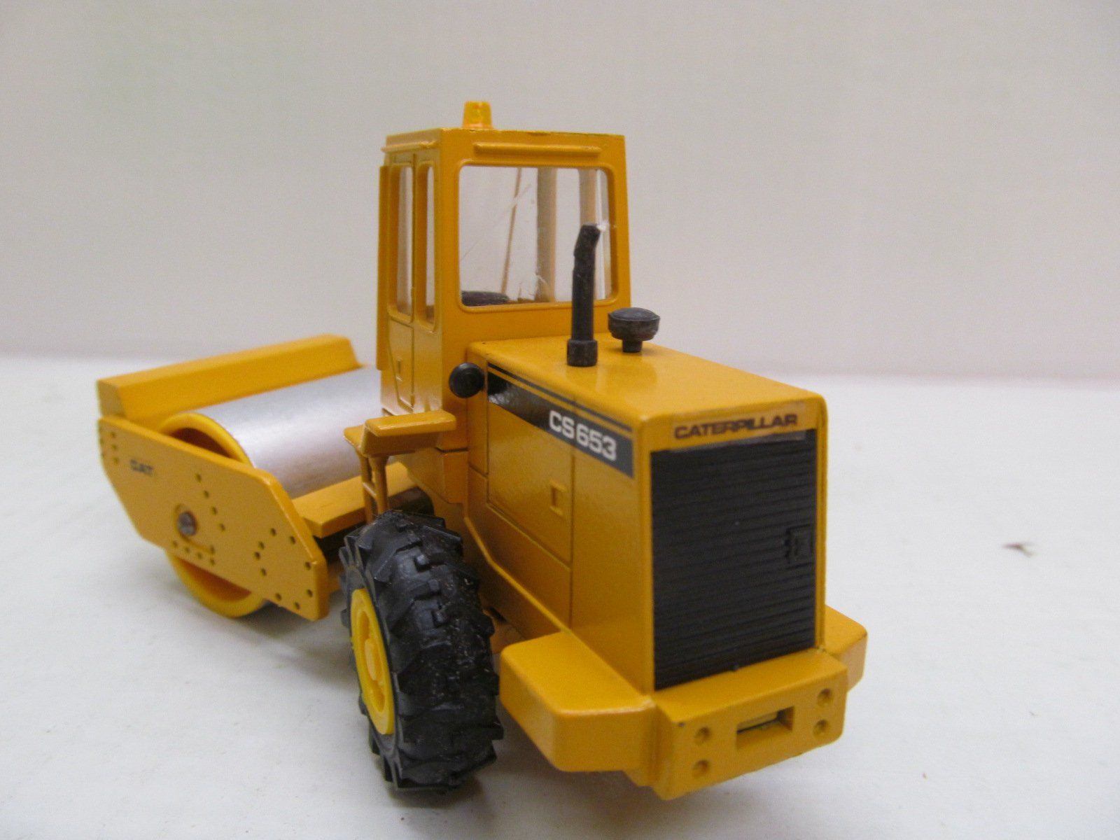 Caterpillar Kit di modellismo & Modellini statici: CATERPILLAR  CS 653 VIBRO-WALZE  1:50  CONRAD – Nuovo (secondo la descrizione) da Grueningen venduto da malamut56 1