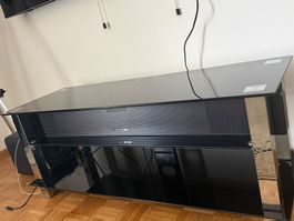 Schicker TV-Tisch aus Glas mit Chrom-Details - Top Zustand!